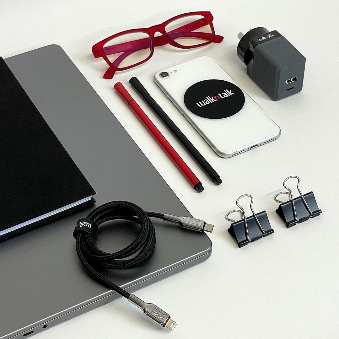 Iphone Fast Charge Lightning to USB-C Cable next to other tech accessories