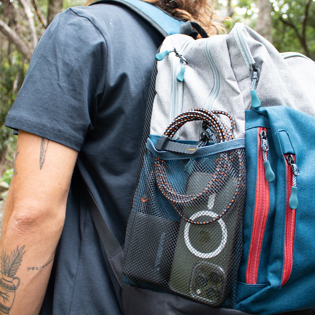 Rugged Kevlar USB C to Lightning Cable in a back pack charging a phone