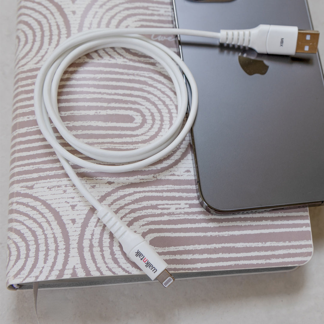 1m White Lightning Charge & Sync Braided Charging Cable next to an iPhone