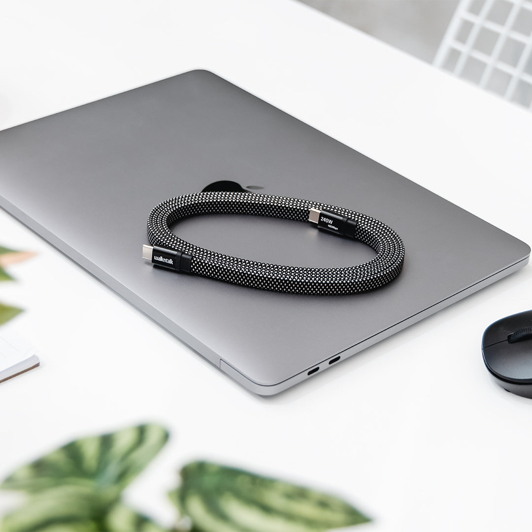 240W USB C to USB C Ultra Magnetic 1.5m Flat Charging Cable on a laptop