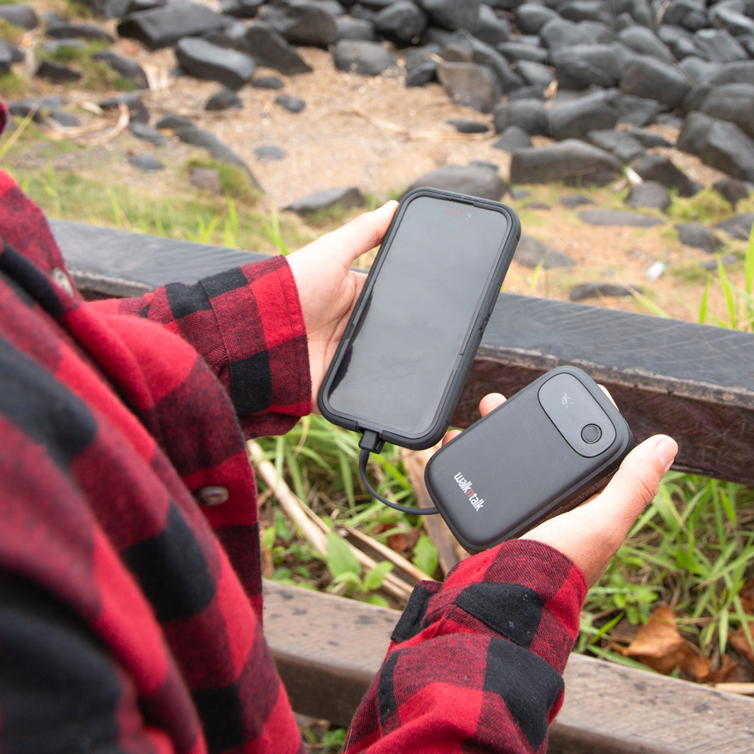 8K Travel Power Bank charging a phone