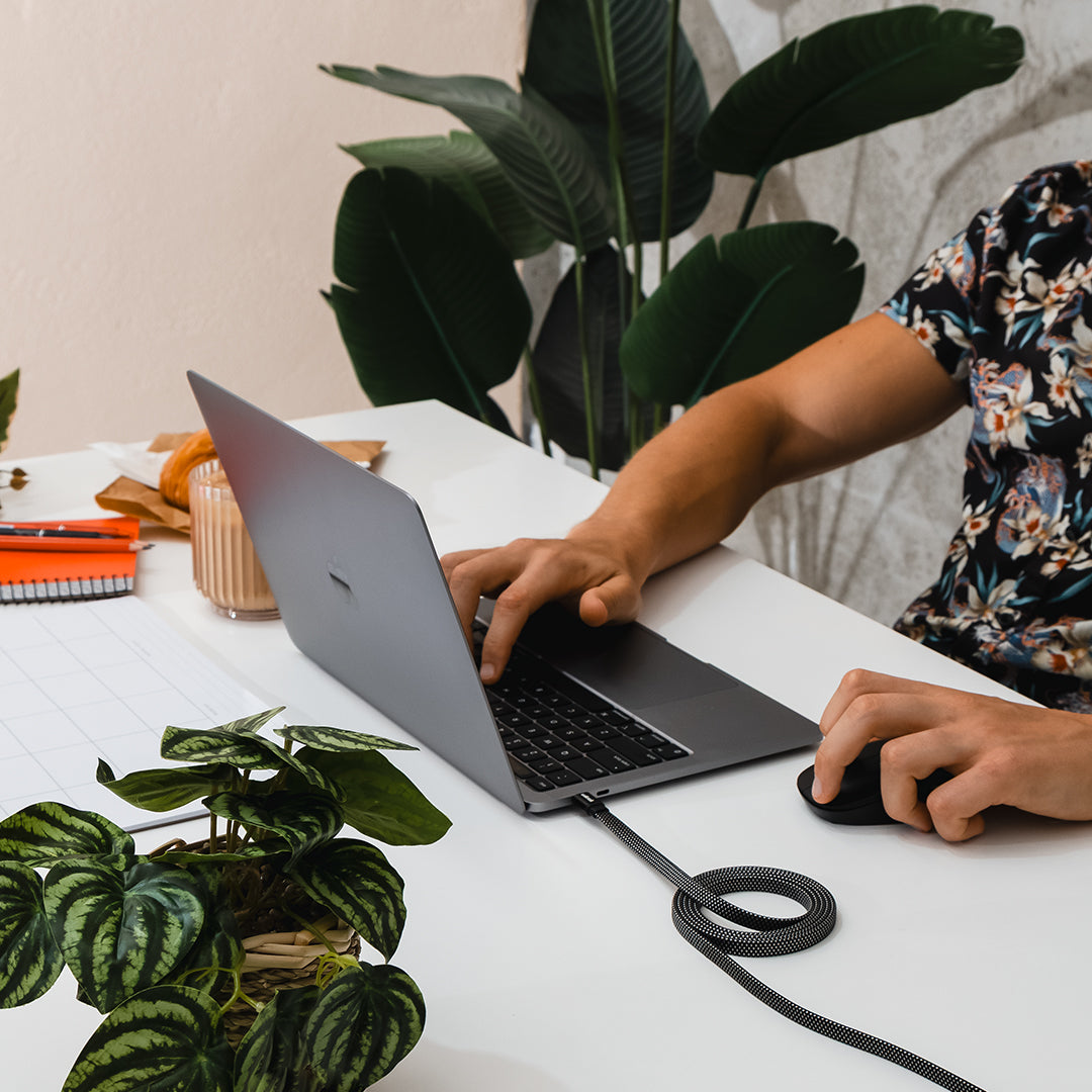 Man charging laptop with a USB C Magnetic Cable for Laptops, Tablets & Phones