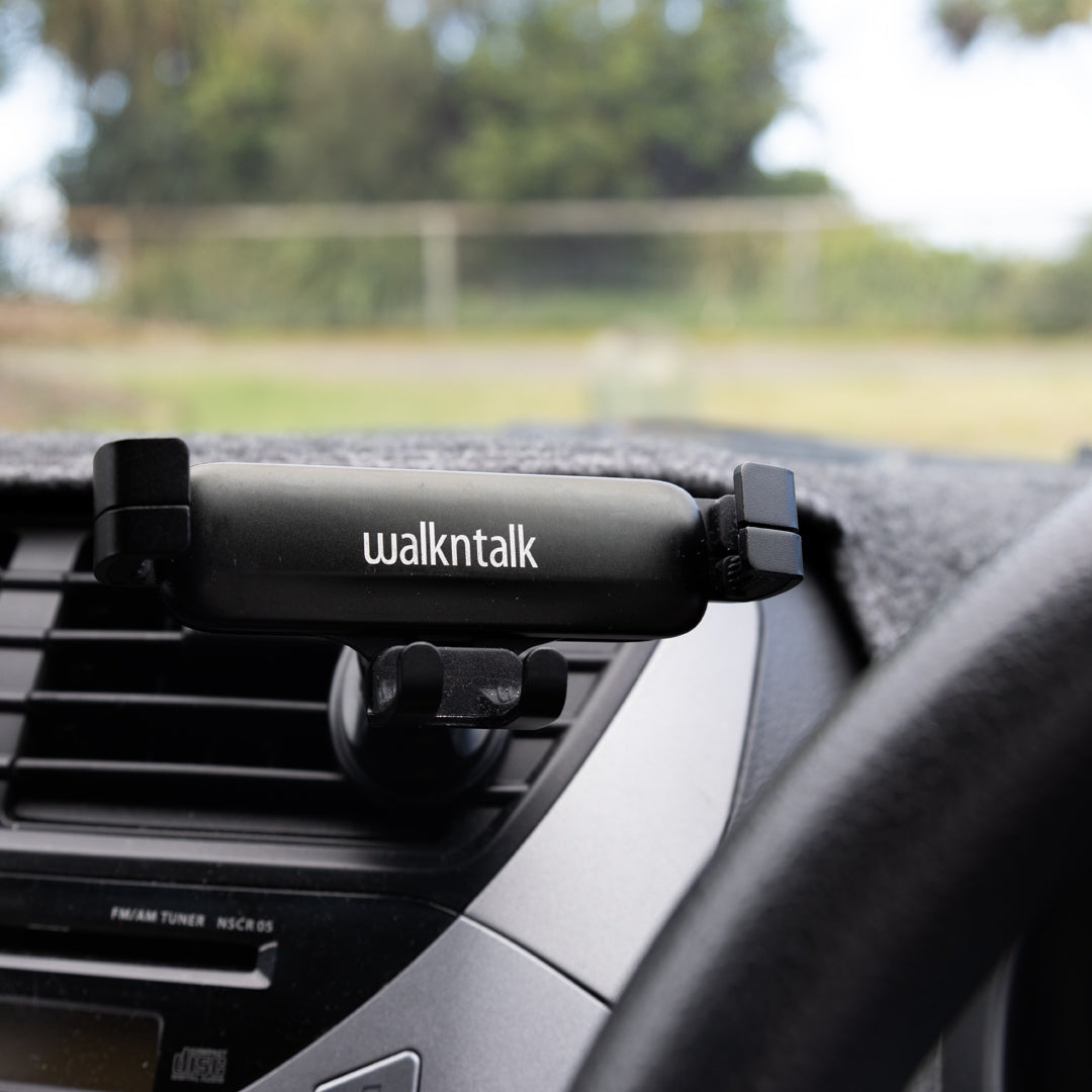 Universal Phone Holder attached to the vent of a car